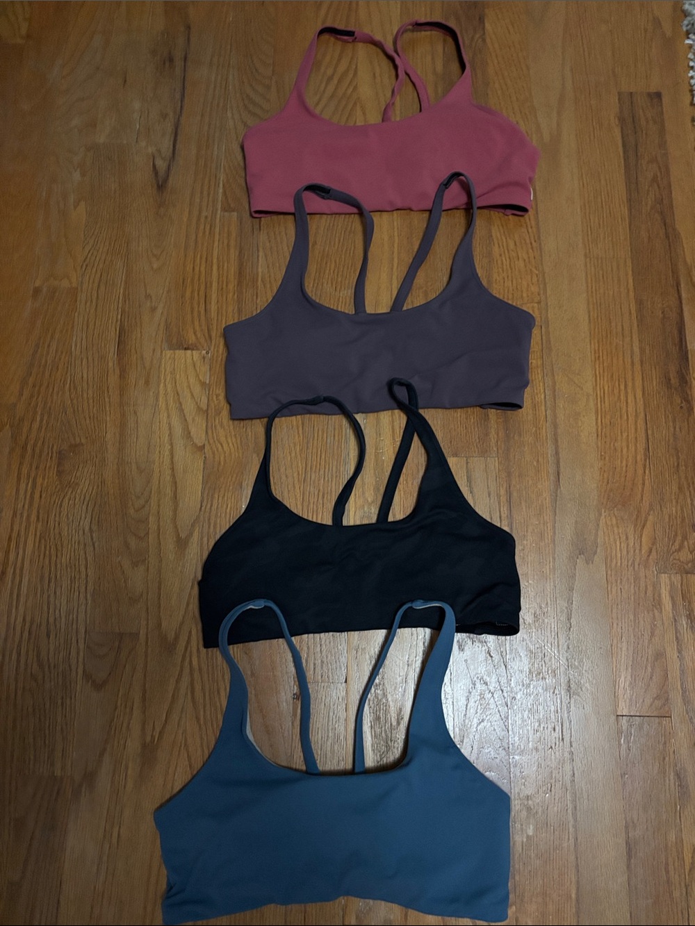 Vuori 4-Pack Low-Impact Scoop Sports Bras in Rose, Mauve, Black & Slate Blue